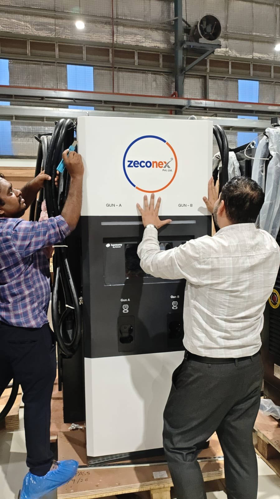ZECONEX Engineers installing dual-gun fast charger